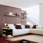 غرفة معيشة مع سرير قابل للطي