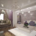 غرفة نوم وغرفة معيشة في شقة من غرفتين