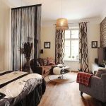 غرفة نوم وغرفة معيشة في نفس الغرفة