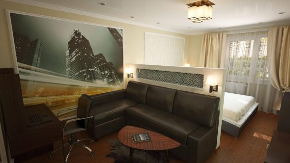 غرفة نوم جنبا إلى جنب مع غرفة المعيشة