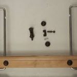 آلية خفض جدار سرير الأطفال