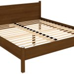 سرير مع قاعدة العظام في غرفة النوم