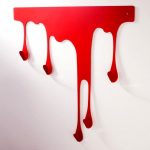 شماعات الجدار في القاعة في شكل الطلاء