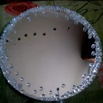 مرآة مستديرة بالحجارة