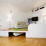 المنصة مع أثاث مدمج وسرير قابل للطي