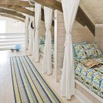 غرفة للأطفال لثلاثة أطفال في العلية