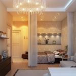 وضع سرير في شقة من غرفة واحدة في نفس النمط مع غرفة معيشة