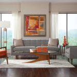 منطقة ضيوف أنيقة مع أريكة وكراسي