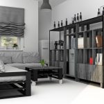 أريكة رمادية سوداء صارمة وطاولة من الخردة