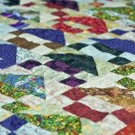 نمط متكرر المنازل على لحاف خليط.