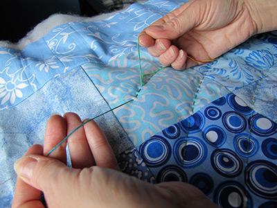 غرزة بطانية يدوية