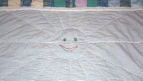 غرزة على بطانية طفل