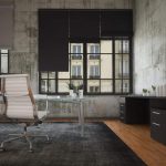 غرفة داخلية بجدران خرسانية على الطراز الصناعي.