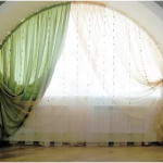 طنف مرن لتسجيل نافذة كبيرة على شكل قوس