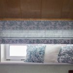 أعمى روماني لنافذة صغيرة في العلية